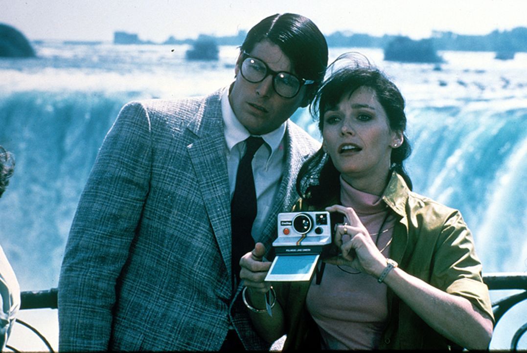 Clark Kent (Christopher Reeve, l.); Lois Lane (Margot Kidder, r.) - Bildquelle: DC Comics.   1981 Warner Bros. Entertainment Inc. All rights reserved.