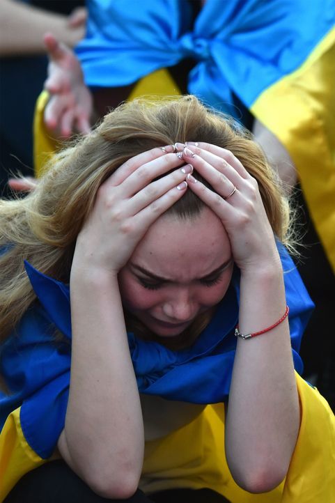 Ukraine_crying_000_BZ6DI_Sergei SUPINSKY_AFP - Bildquelle: AFP / Sergei SUPINSKY
