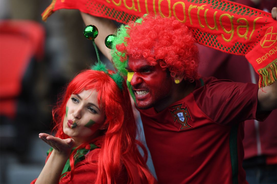 Portogues_kiss_cheering_FRANCISCO LEONG_AFP - Bildquelle: AFP / FRANCISCO LEONG
