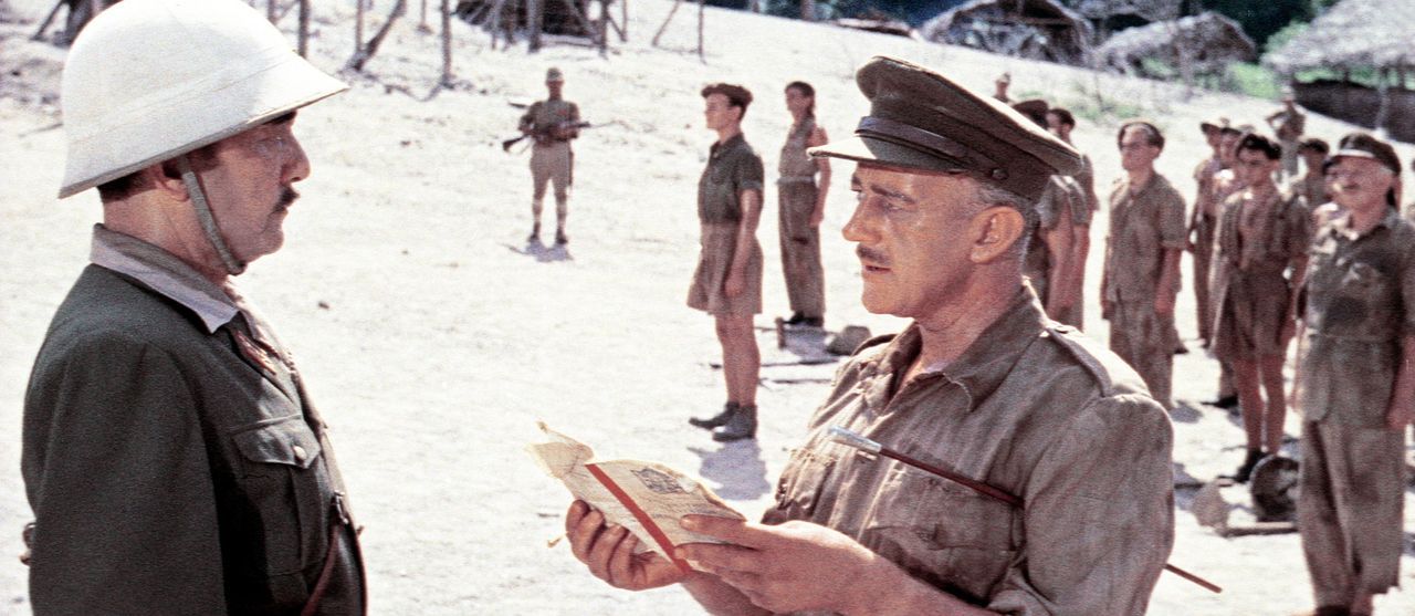 Selbst im Kriegsgefangenenlager lässt sich der eiserne Wille von Oberst Nicholson (Alec Guinness, r.) nicht brechen, was den Lagerkommandant Saito...